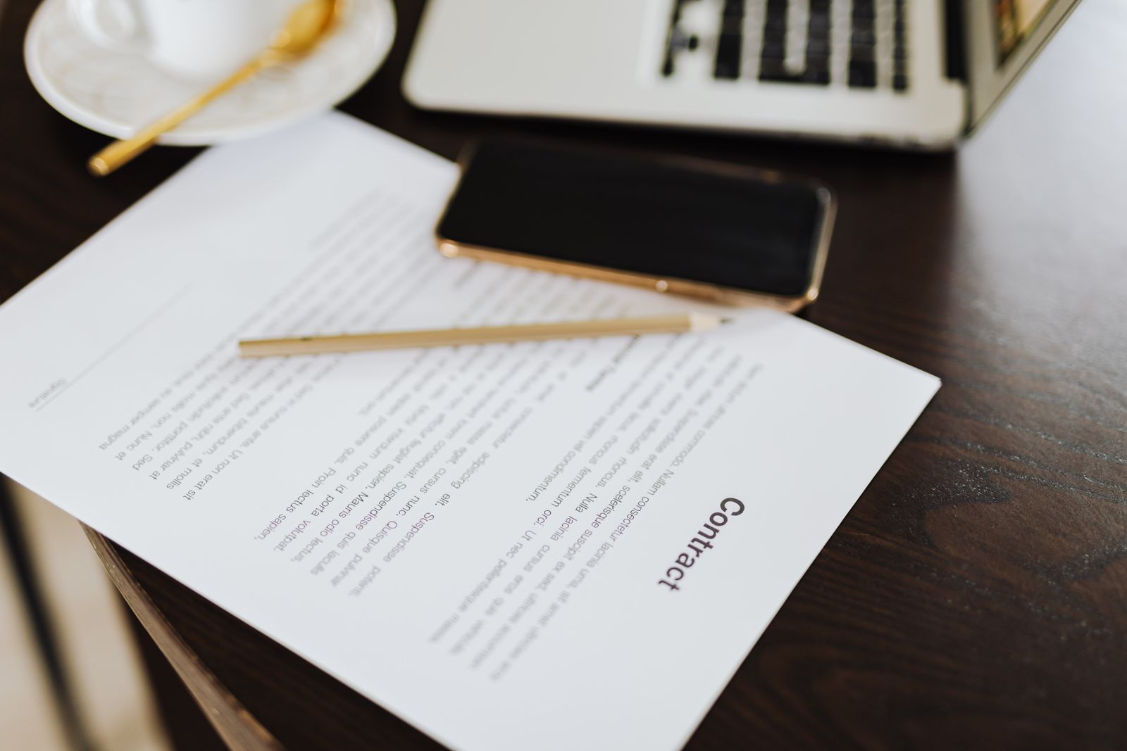 Non-dilutive instruments that fund a SaaS roll-up laid out on a desk